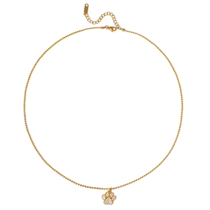 Detailed macro view of 18K gold paw pendant with pave diamonds on stainless steel chain