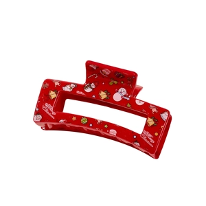 Red Christmas hair claw clip with snowman and merry christmas print for festive styling