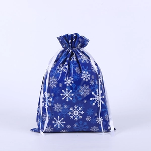 Blue Christmas drawstring gift bag with snowflake patterns and white silk ribbon