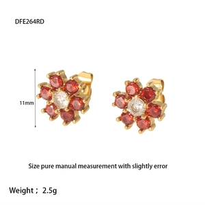 Detailed view of flower-shaped stud earrings with red and white zircons in 11mm size
