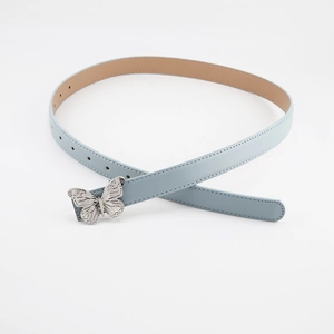 Close-up of light blue leather belt featuring a silver butterfly buckle and metal eyelets