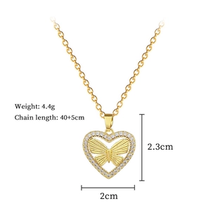 Detail showing dimensions and 4.4g weight of the gold heart butterfly pendant necklace