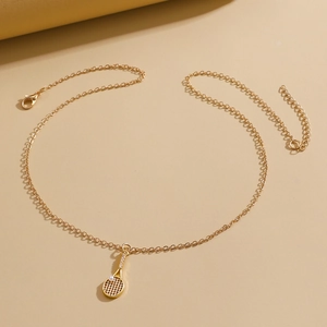 Tennis racket pendant necklace in gold finish with sparkling zircons and a small pearl