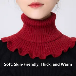 Close-up of red ribbed knit dickey collar with ruffle hem for women's winter warmth