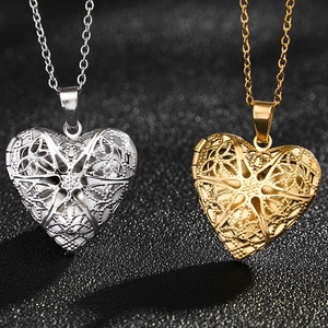Collar de relicario de corazón en acero 316L con estrella calada en oro y plata