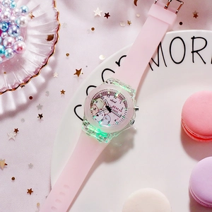 Pink unicorn kids watch with green LED backlight and cute cartoon bear on the dial