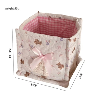 Detail view showing dimensions of square quilted fabric storage basket with bear pattern