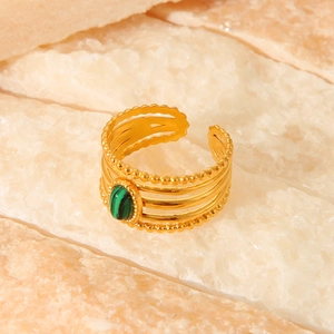 Detail of green malachite stone on gold plated hollow stainless steel open ring