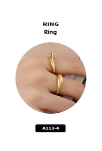 Detailed view of minimalist gold lava-style rings on hand with irregular geometric design