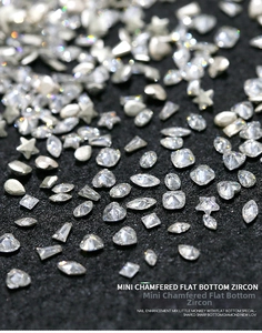 Macro view of mini clear 5A zircon rhinestones for nail art with various faceted shapes