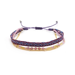 Detail view of multi-layer Bohemian bracelets with woven fabric and Miyuki beads