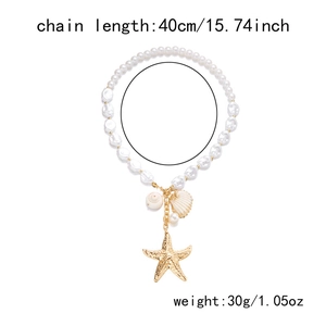 Macro detail of gold starfish, seashell, and pearl pendants with dimensions 40cm and 30g