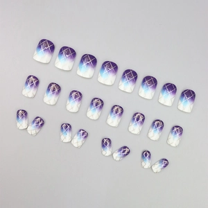 Purple and blue gradient press-on nails with silver grid patterns and glitter finish