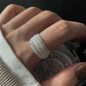 Minimalist multi-layer silver wire ring for women with stylish industrial design look