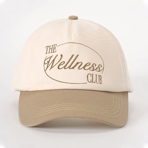 Two-tone Wellness Club embroidered baseball cap in cream and khaki with adjustable strap