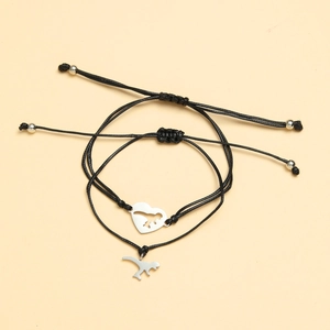 Detail of adjustable black woven bracelets with stainless steel dinosaur and heart charms