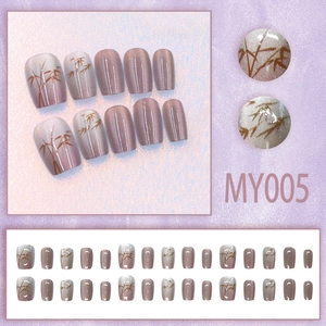 Faux ongles œil de chat motif bambou avec dégradé rose et forme cercueil courte