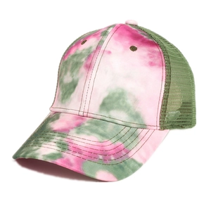 Detail of pink and green tie-dye trucker hat with breathable mesh and stitched brim
