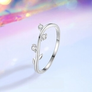 Detailed macro view of S925 sterling silver vine ring with three sparkling zircons