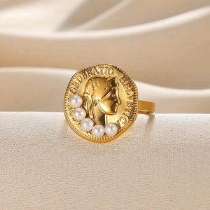 Gold stainless steel ring with vintage coin design and pearl accents on elegant base