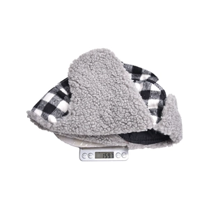 Black and white plaid winter trapper hat with warm sherpa lining weighing 159.7g