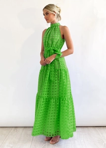 Detail of green halter neck maxi dress with plaid texture and waist tie design