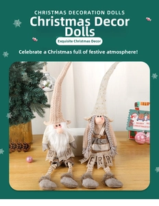 Detail of Christmas gnomes with long hats holding Ho Ho Ho and Merry banners on wood