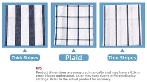 Detailed set of blue and white waffle weave napkins with striped and checkered patterns
