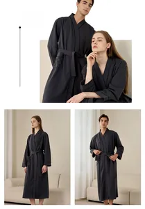 Detail view of charcoal grey waffle weave bathrobe with sash belt and side pockets