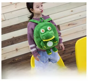 Toddler green plush dinosaur backpack with 3D embroidery and soft shoulder straps
