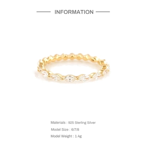 Detailed view of marquise-cut turquoise ring in gold plating with S925 sterling silver band