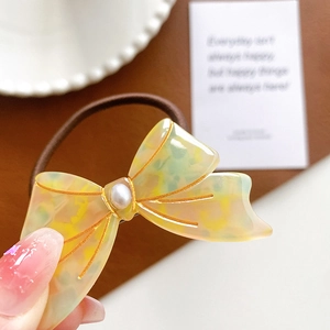 Elegant acetate marble bow hair tie with pearl center and high elasticity band