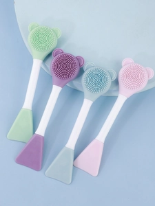 Detail of four-color double-ended silicone facial brushes with cute bear heads