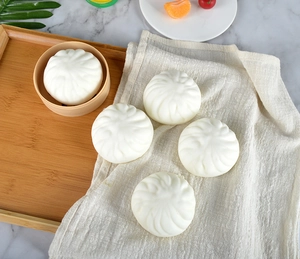 Detailed view of slow rebound PU foam squishy toys shaped like realistic steamed buns