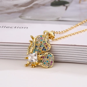 Golden butterfly pendant necklace with colorful cubic zirconia on a gold chain