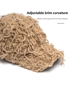 Detail of camel fuzzy baseball cap showing the foldable, widened brim and hairy texture