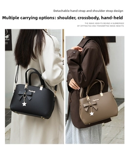 Detail showing women's pebble leather handbag with bow and star metal charms in outdoor setting