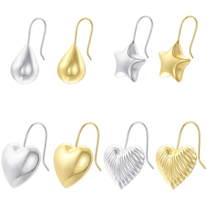 Detailset aus Gold- und Silberohrringen in Herz-, Stern- und Tropfenformen