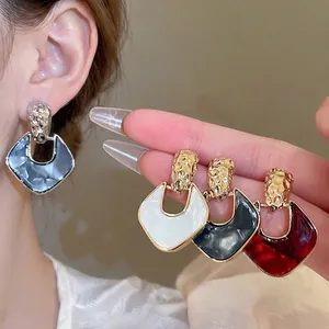 Vintage geometric metal drop earrings with silver pins and colorful acrylic accents