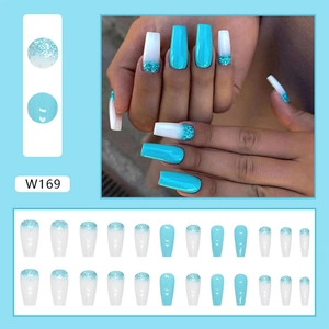 Close-up of long coffin fake nails with blue gradient and glitter sequins, 24pcs set