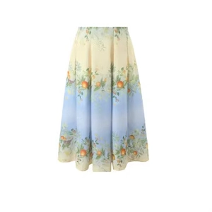 Bohemian gradient maxi skirt with orange fruit print on a clean white background