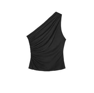 Detail view of black one shoulder top featuring asymmetric ruching and side pleats