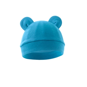 Close-up of baby knit hat with cute round ears in sky blue cotton fabric