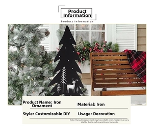 Detail of laser-cut iron Christmas deer and tree silhouette garden stakes for outdoor decor
