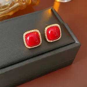 Elegant gold-plated square red zircon earrings with halo pearl and diamond accents