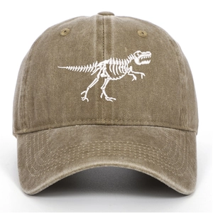 Close-up of T-Rex dinosaur skeleton embroidery on washed cotton baseball cap