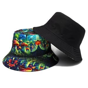 Detail view of reversible bucket hat showing plain black side and vibrant mushroom print
