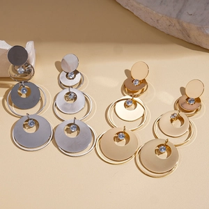 Orecchini geometrici a strati in oro e argento con zircone lucido e design tondo