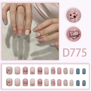 Sweet press-on nail kit with pink gradients, heart patterns and smiley face designs