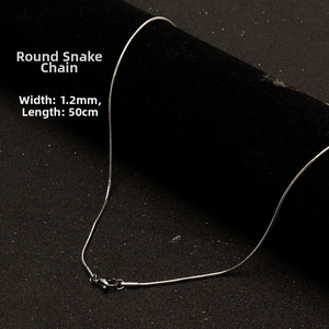 Detailed 1.2mm silver snake chain necklace with lobster clasp on black velvet display